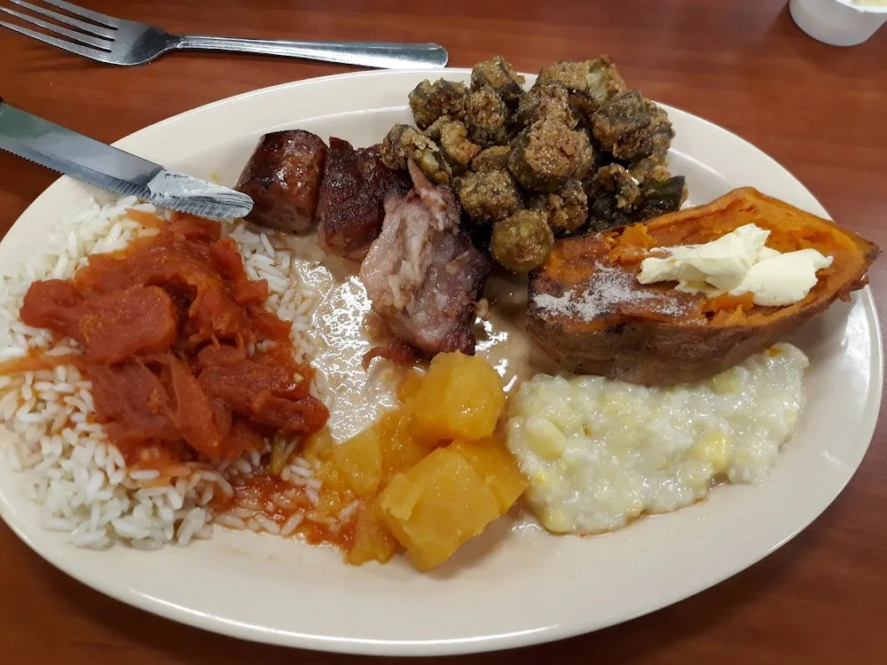 Fried Okra Rice with Tomato Gravy Rutabagas Creamed Corn Baked Sweet Potato and Pork